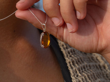 Hand-Carved One-of-a-Kind Amber Sea Glass Pendant with Rhodium-Plated Silver Clasp