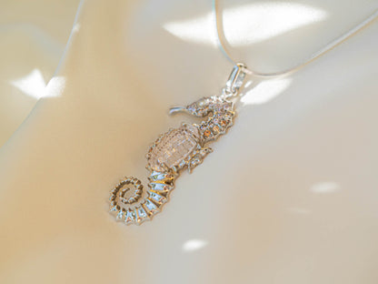 Elegant Seahorse Pendant Necklace with Sparkling Stones and Pink Accent