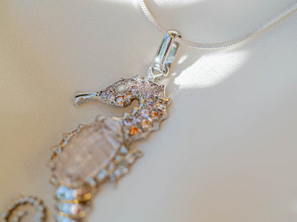 Elegant Seahorse Pendant Necklace with Sparkling Stones and Pink Accent