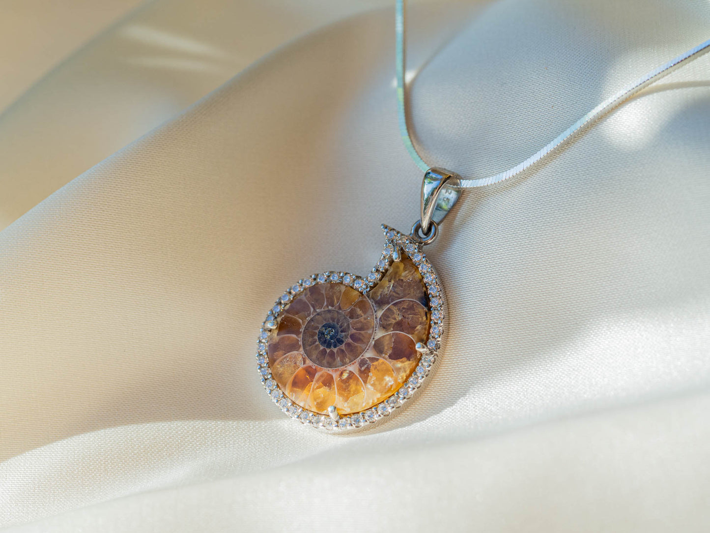 Bejewelled Ammonite Fossil Necklace in Sterling Silver